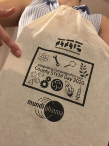 A tote bag with the Girlguiding Cambridgeshire East County STEM day 2020 badge printed on it