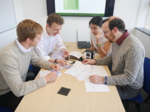 Team working to solve engineering problems